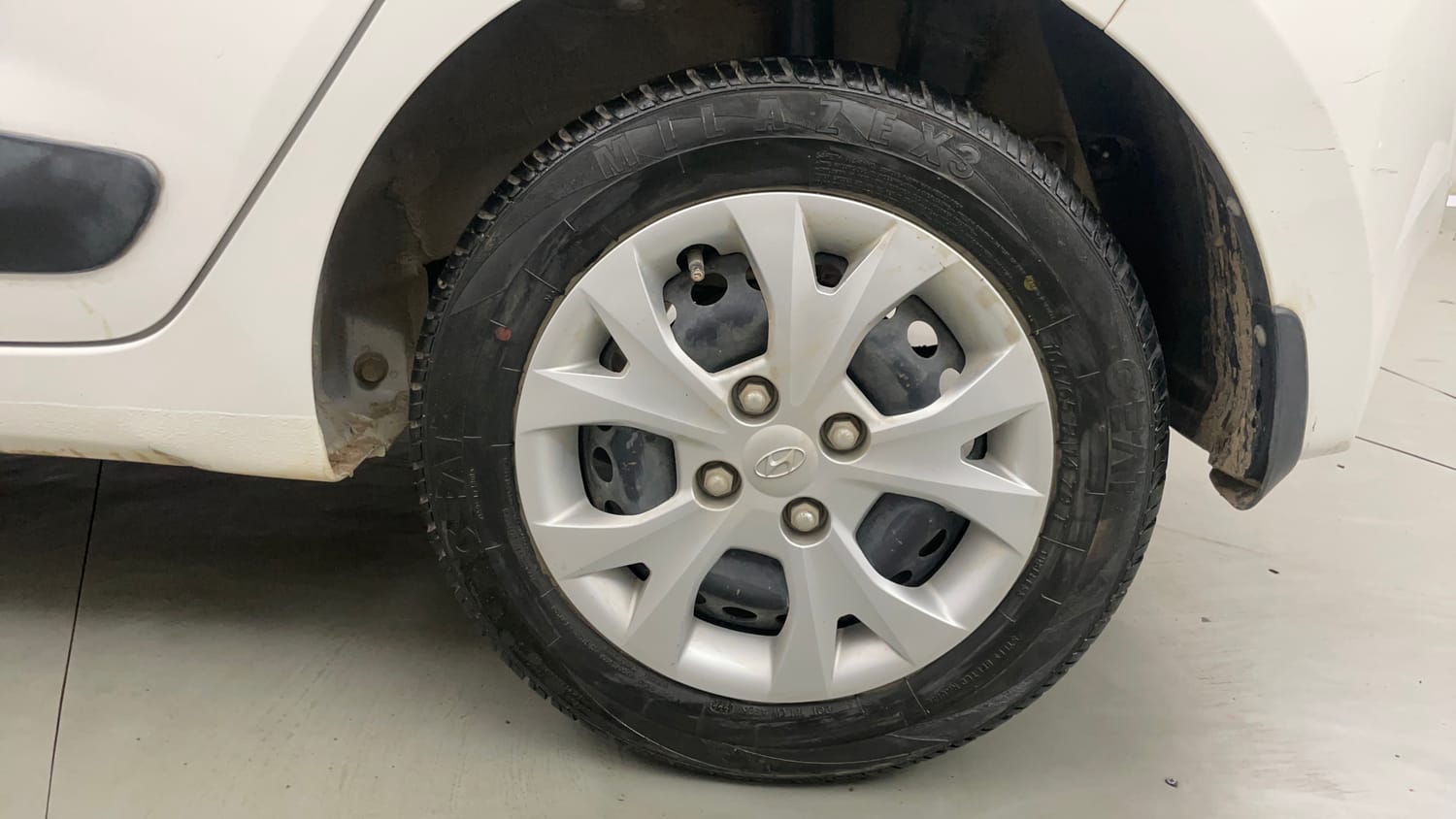 Used 2016 Hyundai Grand i10 Magna 1.2 Kappa VTVT Petrol Manual tyres LEFT REAR TYRE RIM VIEW