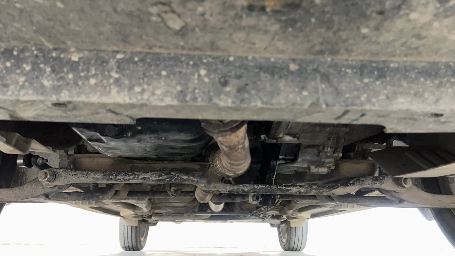 Used 2016 Tata Tiago Revotron XZ Petrol Manual extra FRONT LEFT UNDERBODY VIEW