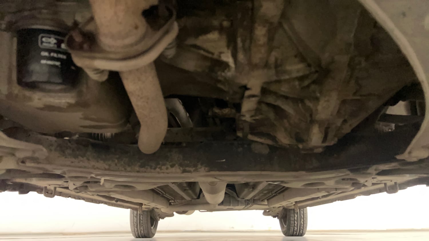 Used 2013 Maruti Suzuki Ertiga Vxi Petrol Manual extra FRONT LEFT UNDERBODY VIEW