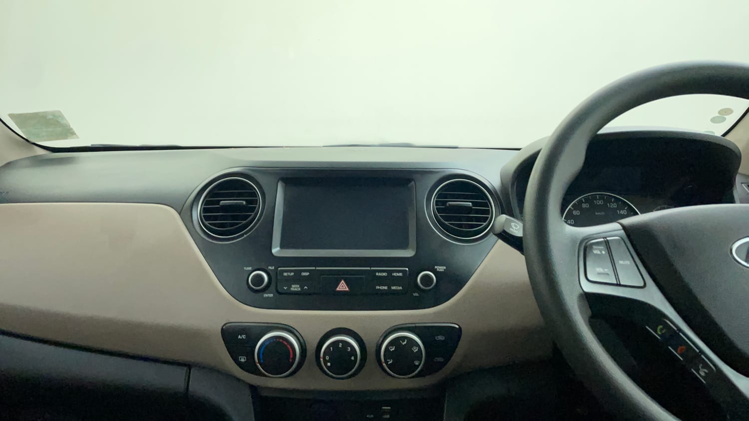 Used 2017 Hyundai Grand i10 Sportz (O) 1.2 Kappa VTVT Petrol Manual interior MUSIC SYSTEM & AC CONTROL VIEW