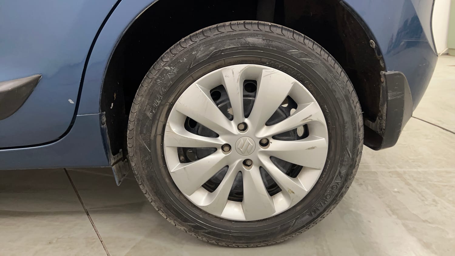 Used 2016 Maruti Suzuki Baleno Delta 1.2 Petrol Manual tyres LEFT REAR TYRE RIM VIEW