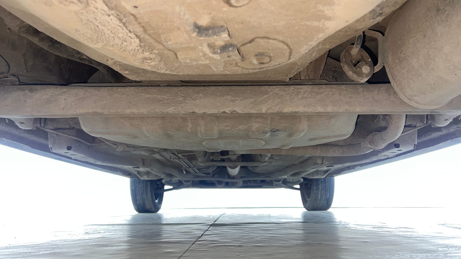 Used 2021 Tata Tiago XZ Petrol Manual extra REAR UNDERBODY VIEW (TAKEN FROM REAR)