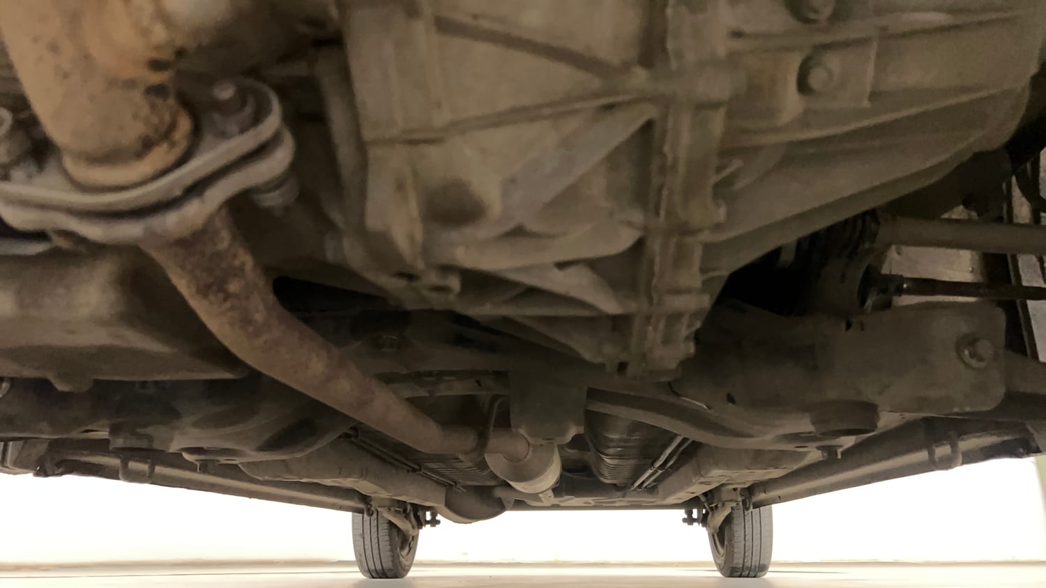 Used 2016 Maruti Suzuki Wagon R 1.0 VXI AMT Petrol Automatic extra FRONT LEFT UNDERBODY VIEW