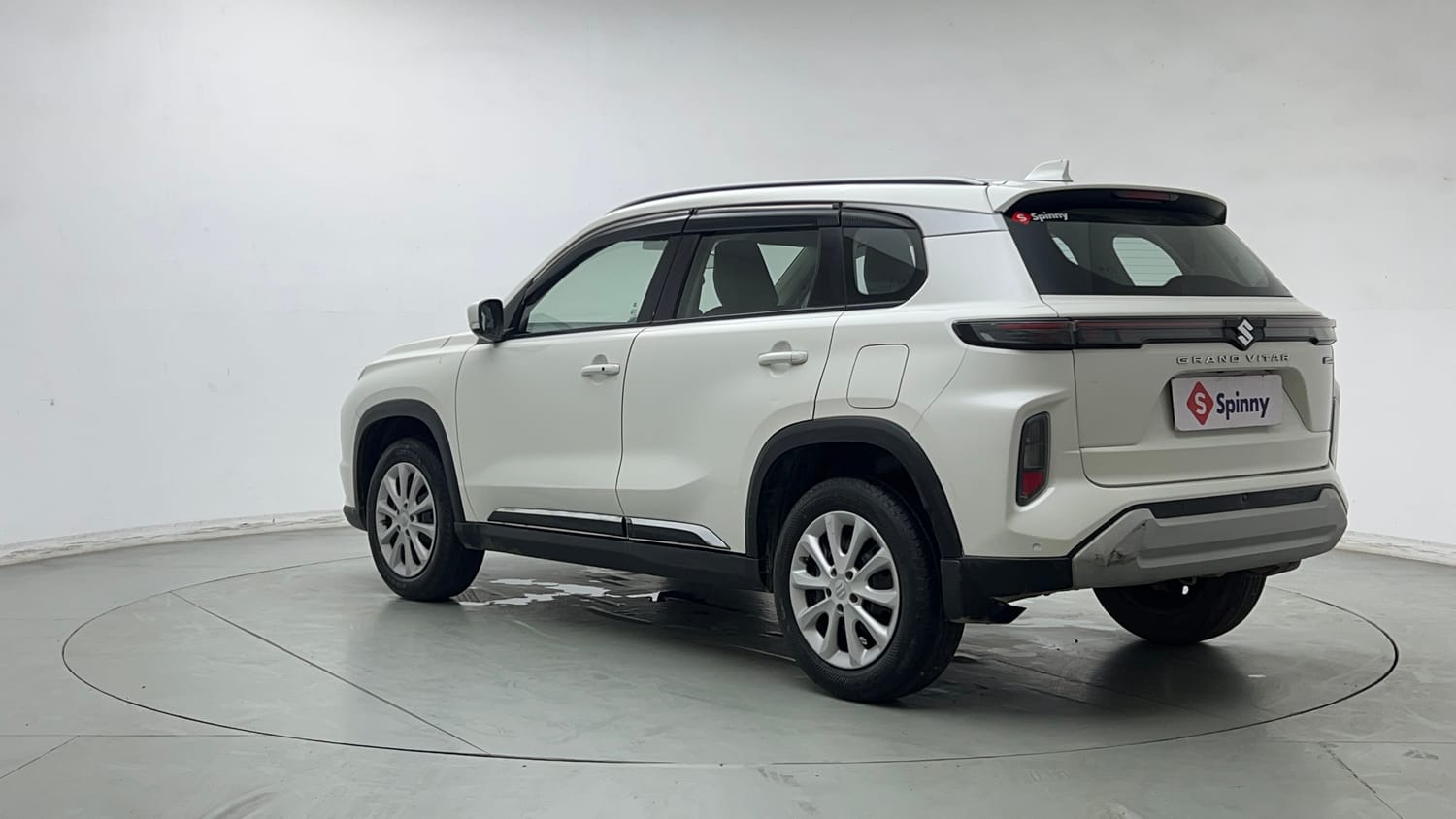 Used 2023 Maruti Suzuki Grand Vitara Sigma Smart Hybrid Petrol Manual exterior LEFT REAR CORNER VIEW