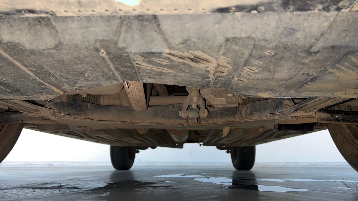 Used 2023 Maruti Suzuki Grand Vitara Sigma Smart Hybrid Petrol Manual extra FRONT LEFT UNDERBODY VIEW