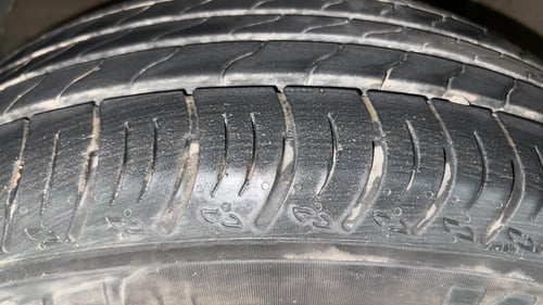 Used 2023 Maruti Suzuki XL6 Zeta AT Petrol Petrol Automatic tyres LEFT FRONT TYRE TREAD VIEW