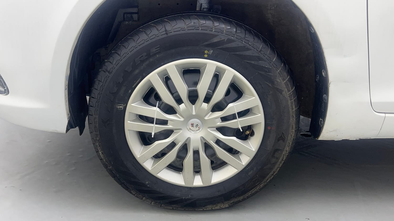 Used 2016 Maruti Suzuki Swift Dzire VXI Petrol Manual tyres LEFT FRONT TYRE RIM VIEW