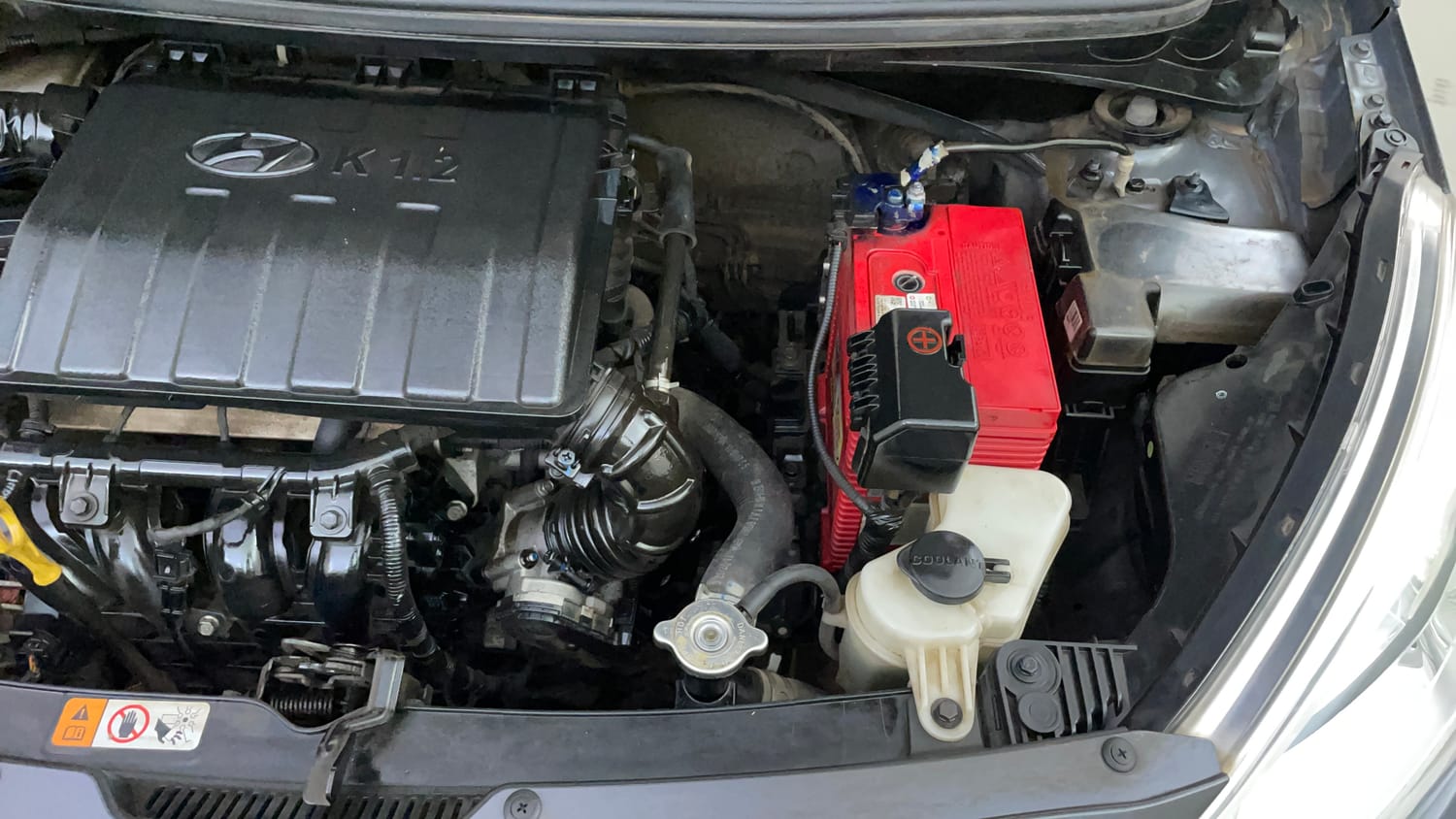 Used 2017 Hyundai Grand i10 Sportz (O) 1.2 Kappa VTVT Petrol Manual engine ENGINE LEFT SIDE VIEW