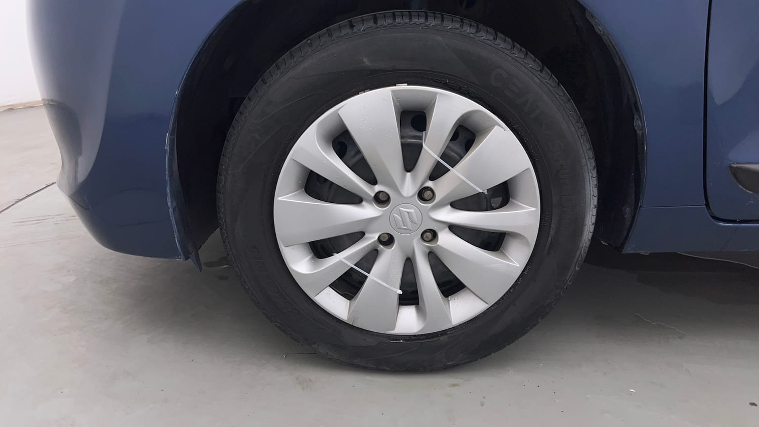Used 2017 Maruti Suzuki Baleno Delta 1.2 Petrol Manual tyres LEFT FRONT TYRE RIM VIEW