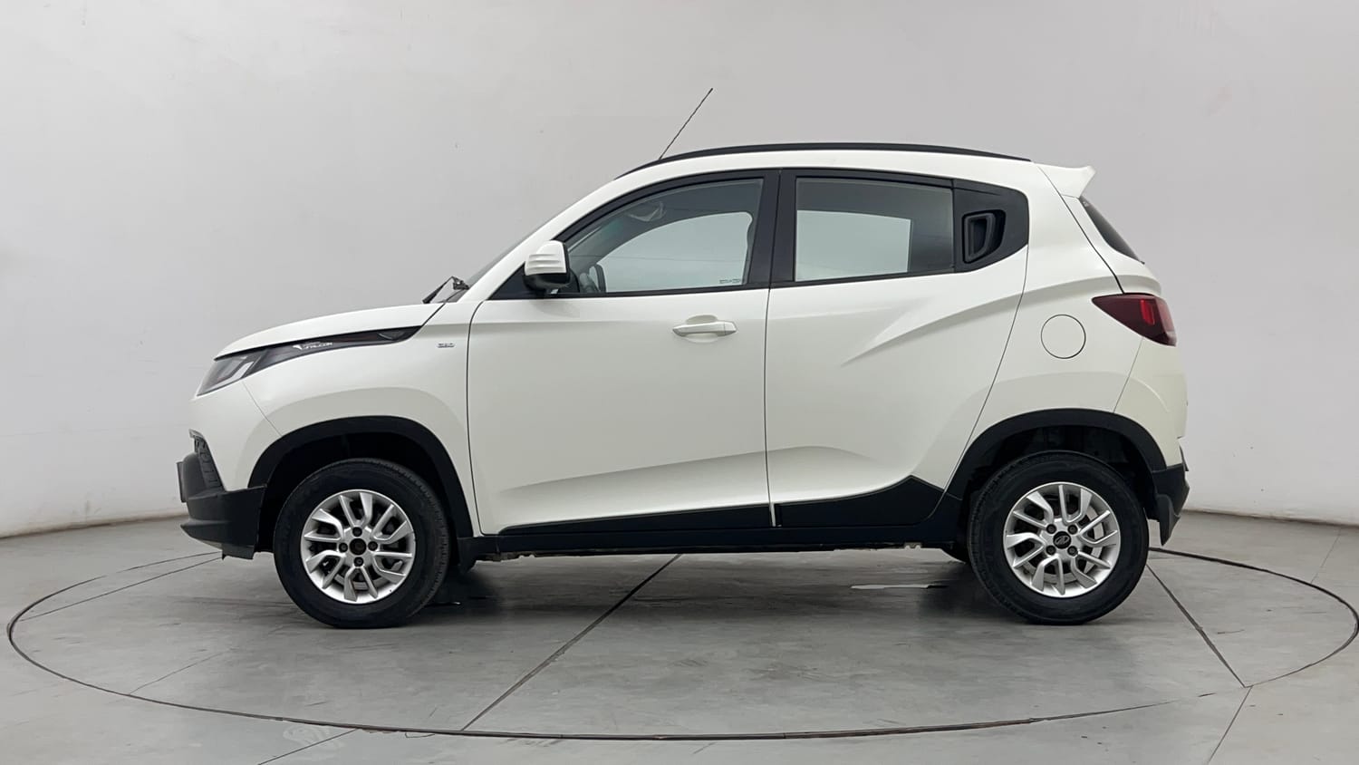 Used 2017 Mahindra KUV100 K6 6 STR Petrol Manual exterior LEFT SIDE VIEW