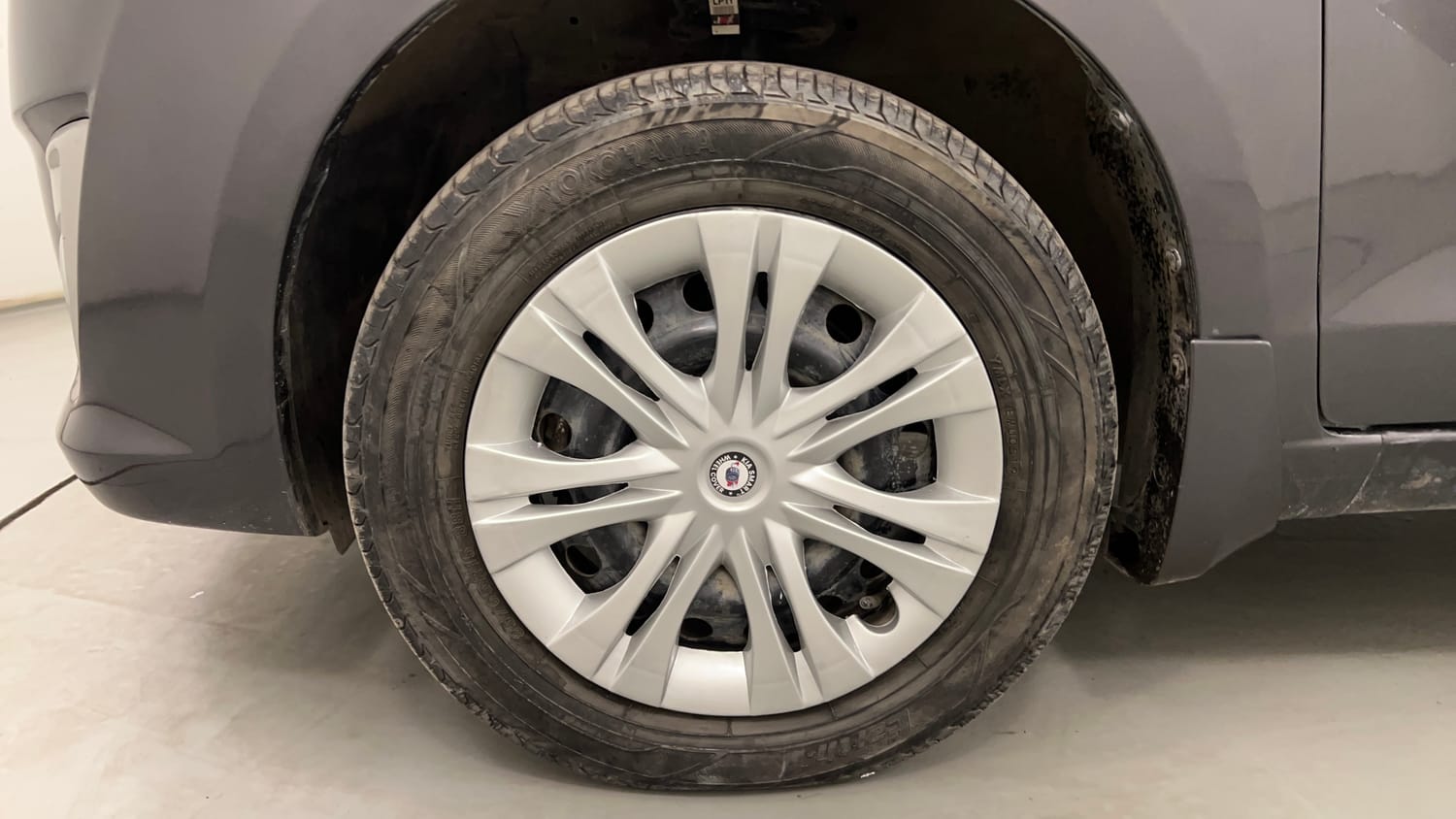 Used 2013 Maruti Suzuki Ertiga Vxi Petrol Manual tyres LEFT FRONT TYRE RIM VIEW