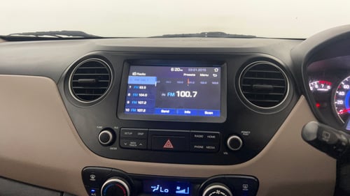 Used 2017 Hyundai Grand i10 Asta 1.2 Kappa VTVT Petrol Manual top_features Integrated (in-dash) music system