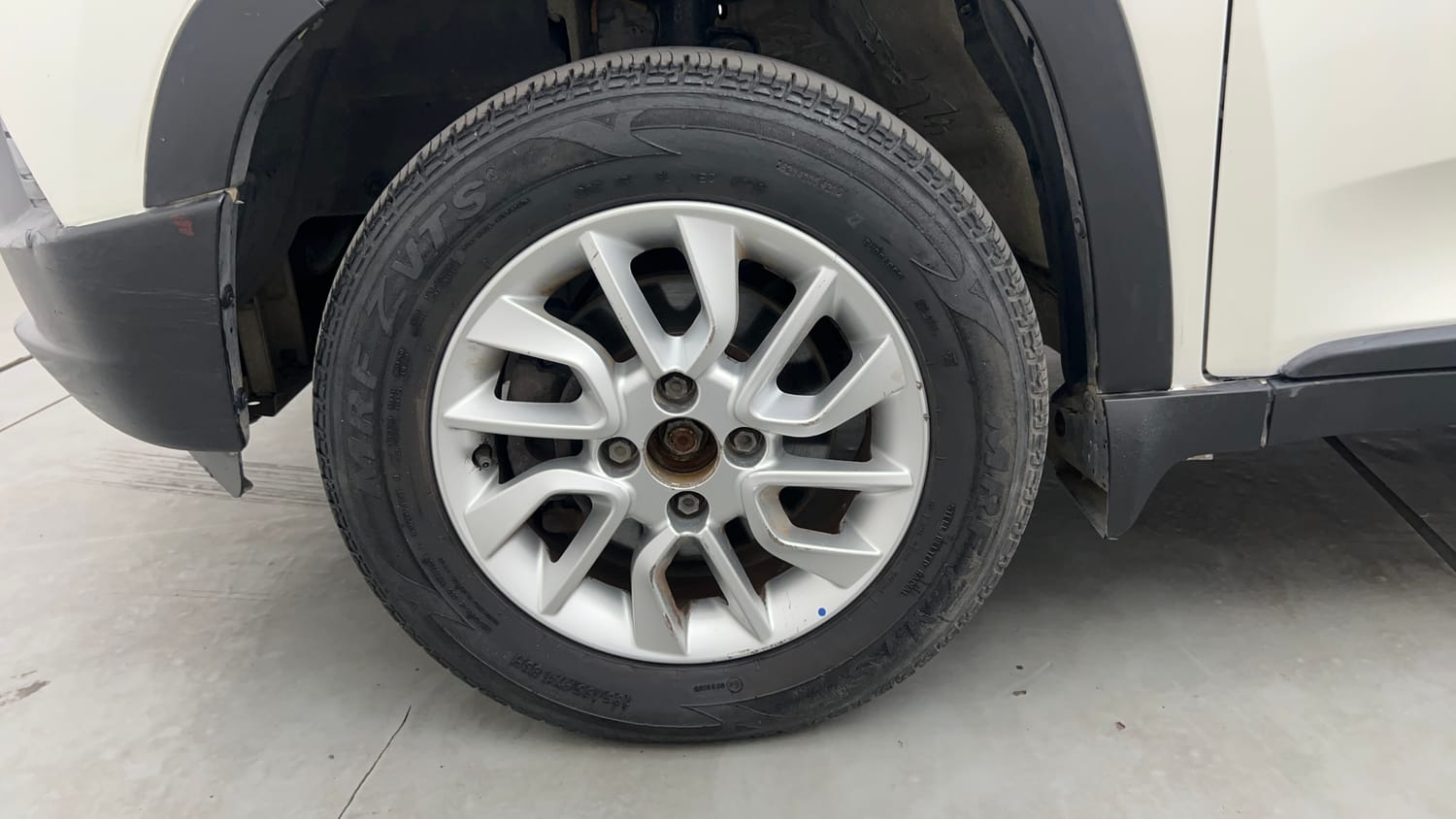 Used 2017 Mahindra KUV100 K6 6 STR Petrol Manual tyres LEFT FRONT TYRE RIM VIEW