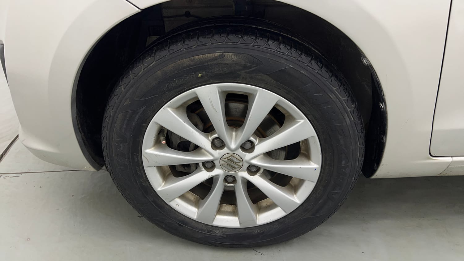 Used 2014 Maruti Suzuki Ertiga ZXi Petrol Manual tyres LEFT FRONT TYRE RIM VIEW