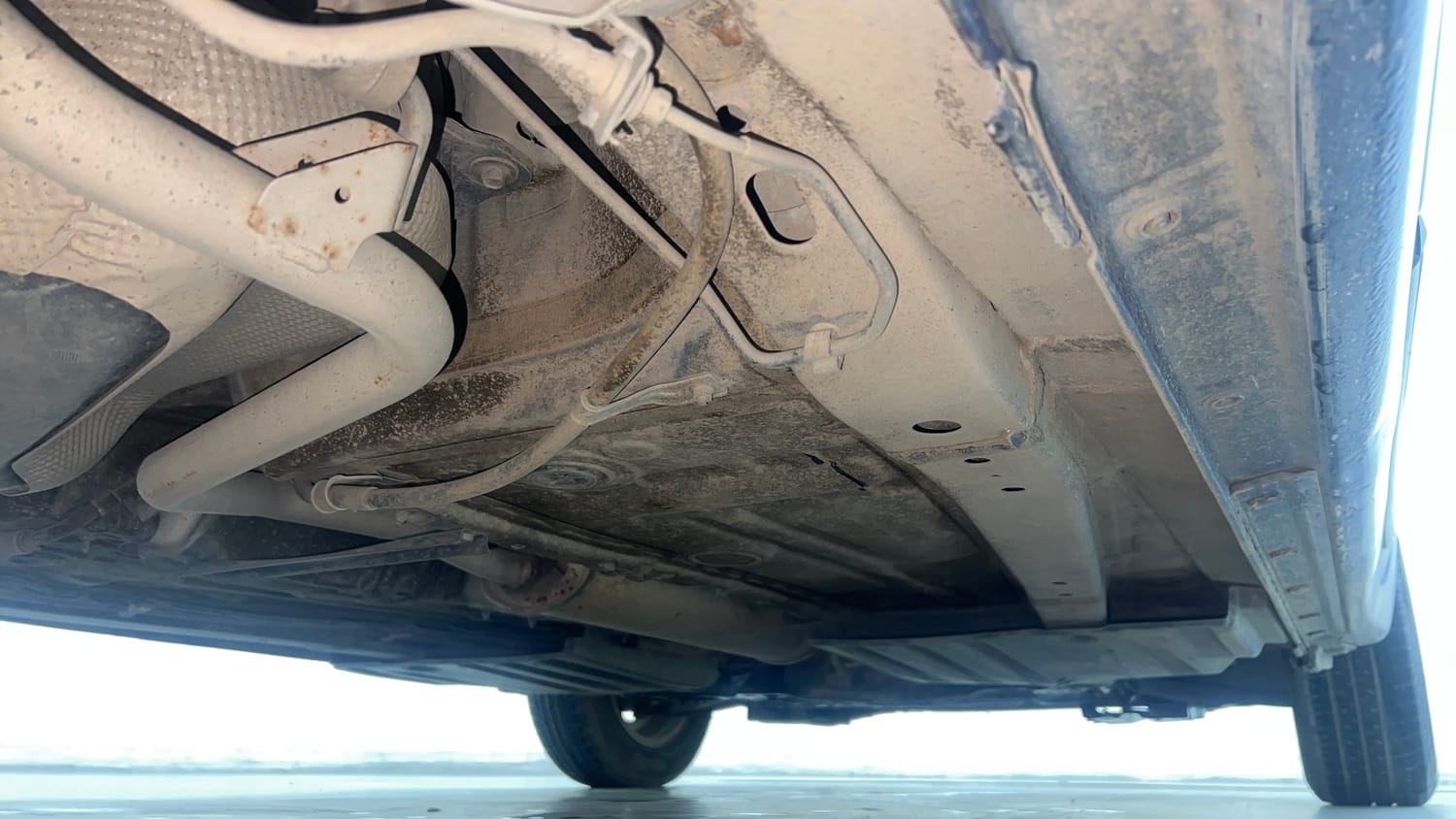 Used 2021 Maruti Suzuki Dzire ZXi Plus AGS Petrol Automatic extra REAR RIGHT UNDERBODY VIEW