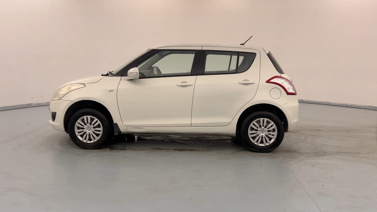 Used 2012 Maruti Suzuki Swift VXi Petrol Manual exterior LEFT SIDE VIEW