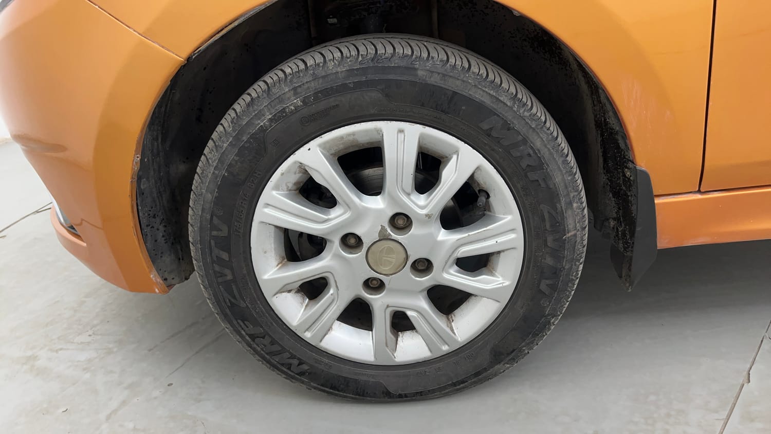 Used 2016 Tata Tiago Revotron XZ Petrol Manual tyres LEFT FRONT TYRE RIM VIEW