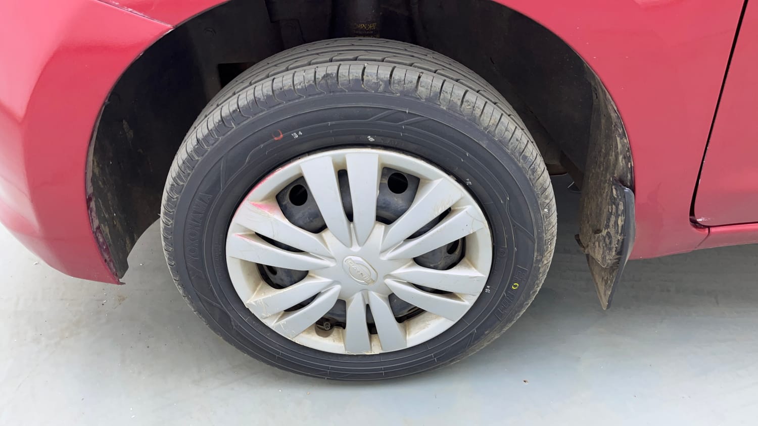Used 2015 Datsun GO T Petrol Manual tyres LEFT FRONT TYRE RIM VIEW
