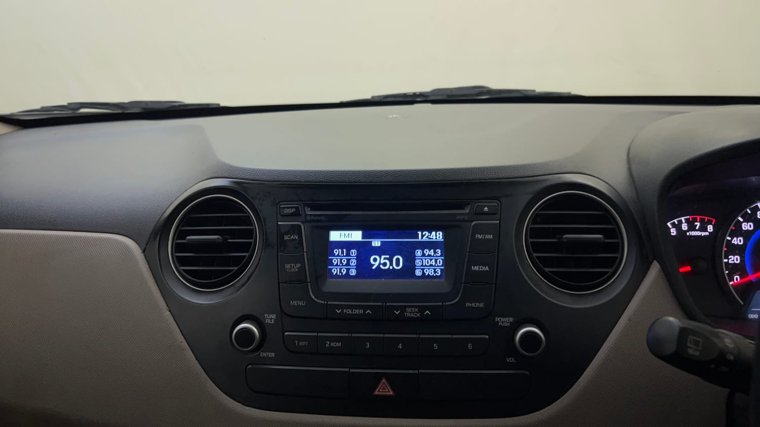 Used 2015 Hyundai Grand i10 Asta 1.2 Kappa VTVT Petrol Manual top_features Integrated (in-dash) music system