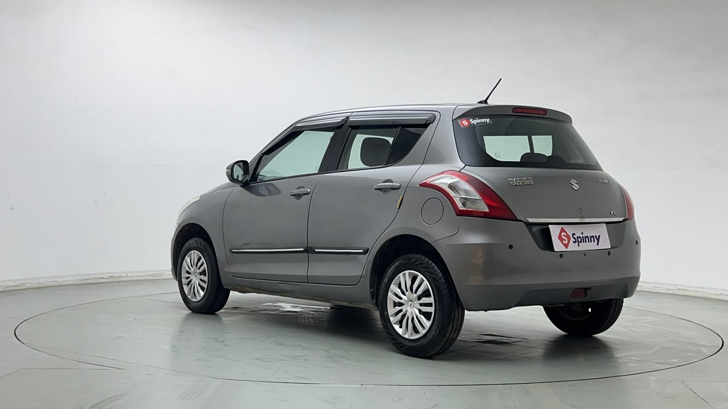 Used 2015 Maruti Suzuki Swift VXi Petrol Manual exterior LEFT REAR CORNER VIEW