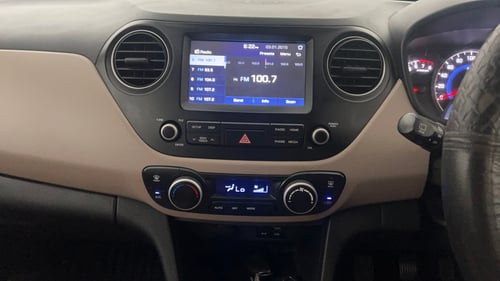 Used 2017 Hyundai Grand i10 Asta 1.2 Kappa VTVT Petrol Manual interior MUSIC SYSTEM & AC CONTROL VIEW