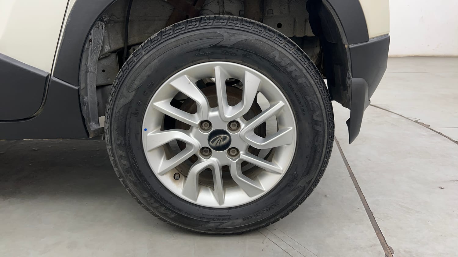 Used 2017 Mahindra KUV100 K6 6 STR Petrol Manual tyres LEFT REAR TYRE RIM VIEW
