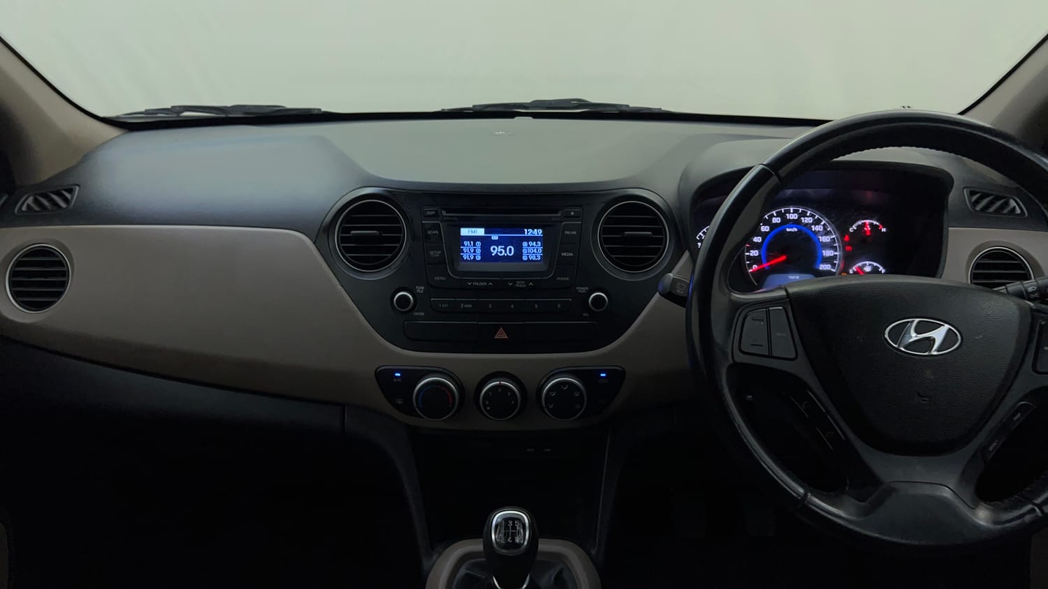 Used 2015 Hyundai Grand i10 Asta 1.2 Kappa VTVT Petrol Manual interior MUSIC SYSTEM & AC CONTROL VIEW