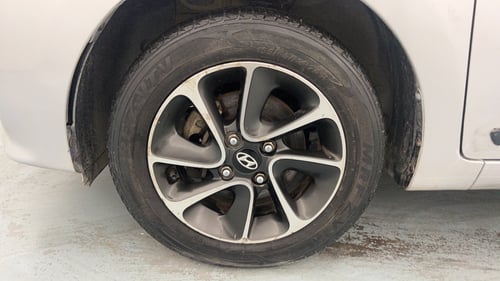 Used 2017 Hyundai Grand i10 Asta 1.2 Kappa VTVT Petrol Manual tyres LEFT FRONT TYRE RIM VIEW