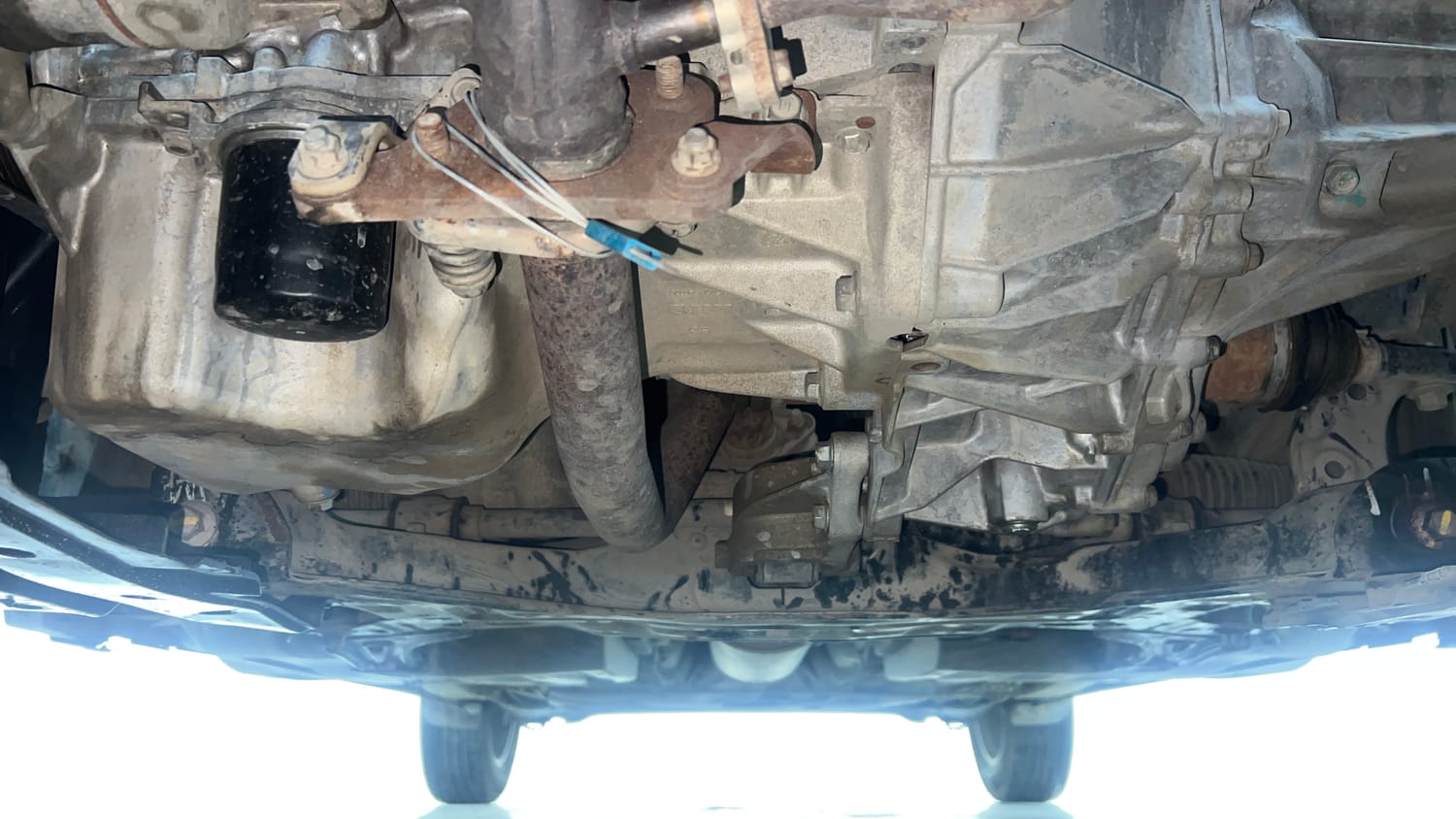 Used 2021 Maruti Suzuki Dzire ZXi Plus AGS Petrol Automatic extra FRONT LEFT UNDERBODY VIEW