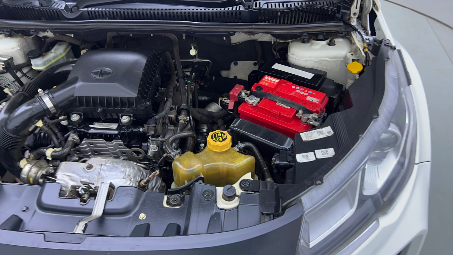 Used 2021 Tata Nexon XZA Plus (S) Petrol Automatic engine ENGINE LEFT SIDE VIEW
