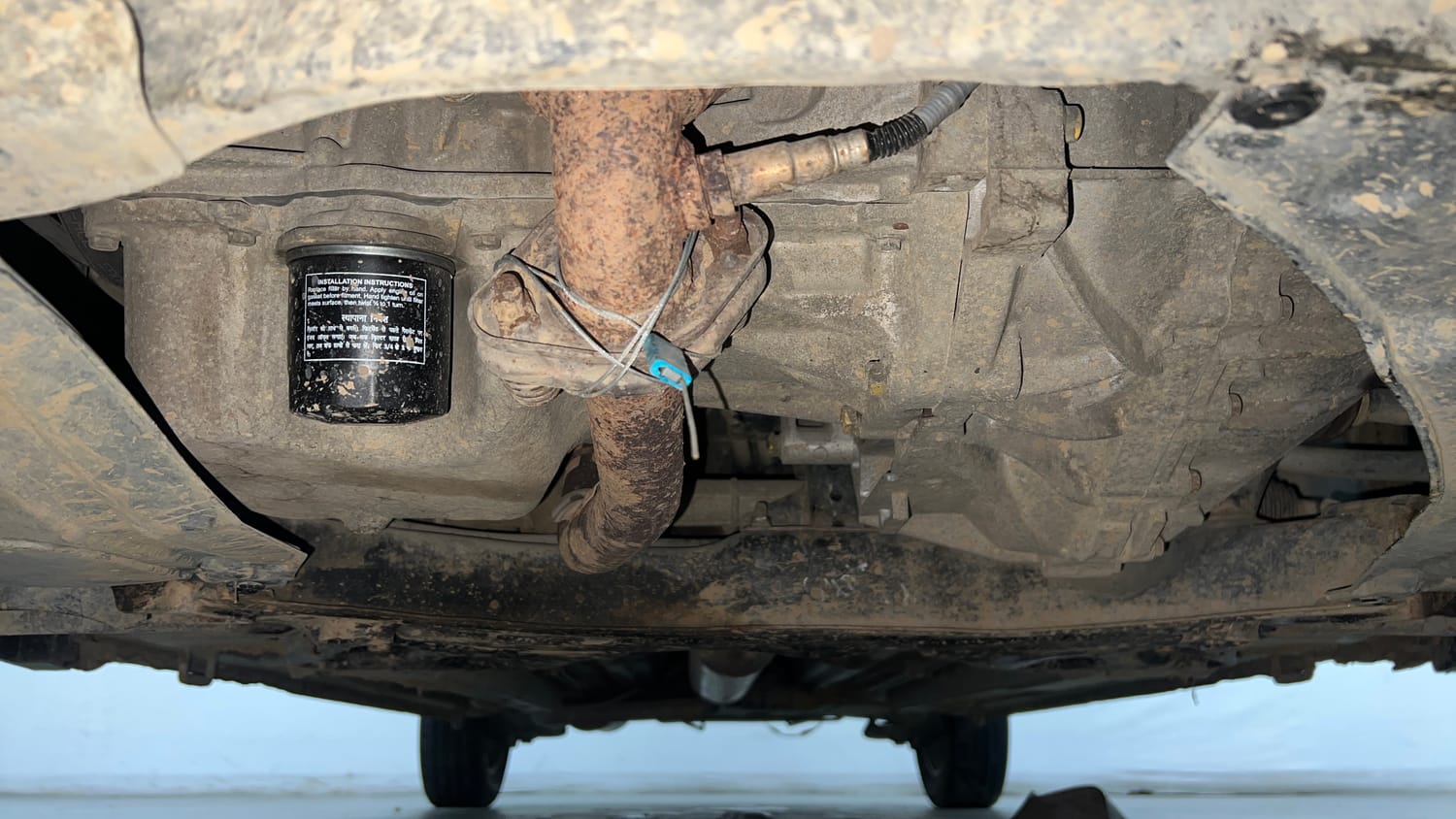 Used 2014 Maruti Suzuki Ertiga ZXi Petrol Manual extra FRONT LEFT UNDERBODY VIEW