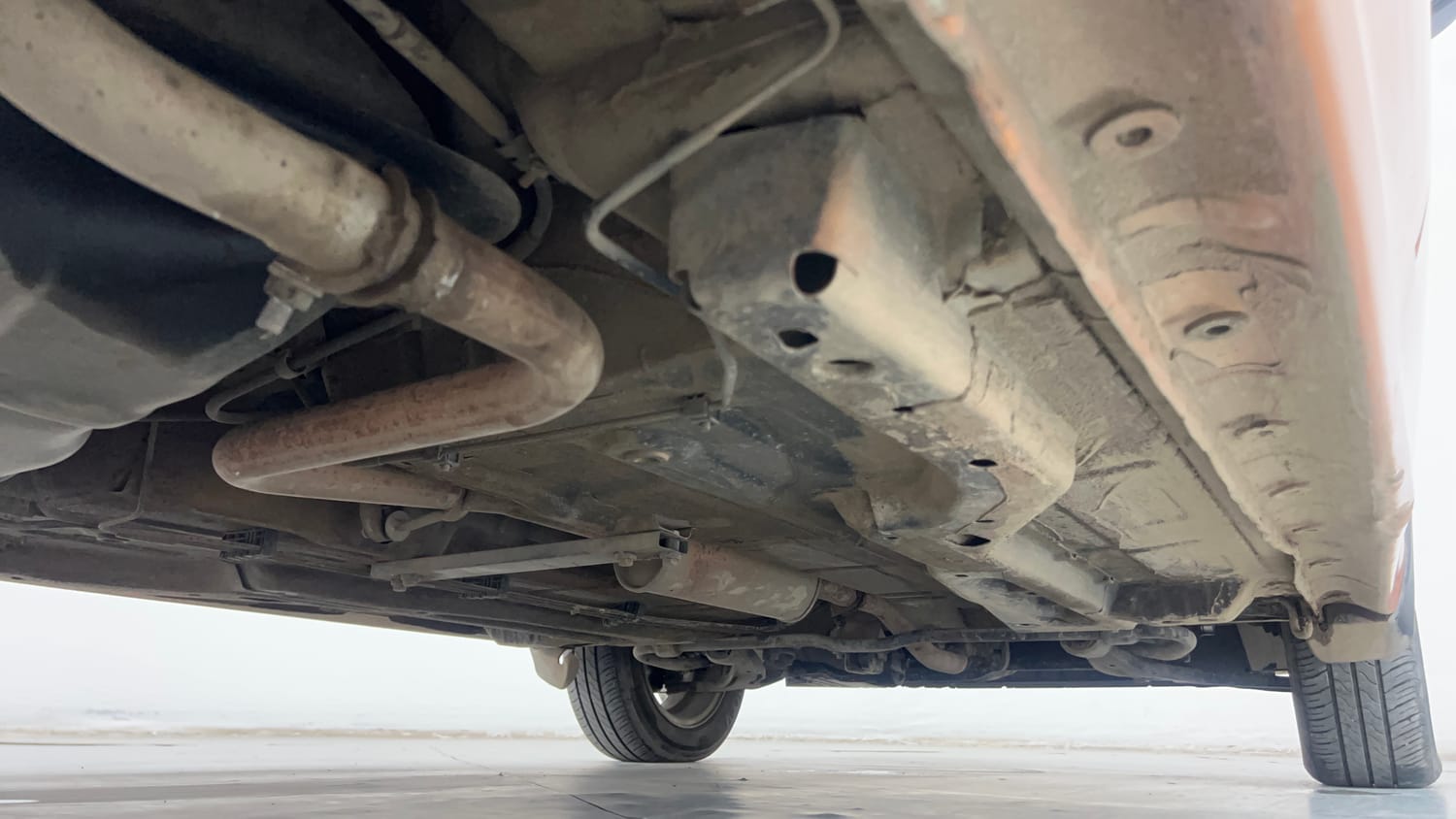 Used 2016 Tata Tiago Revotron XZ Petrol Manual extra REAR RIGHT UNDERBODY VIEW