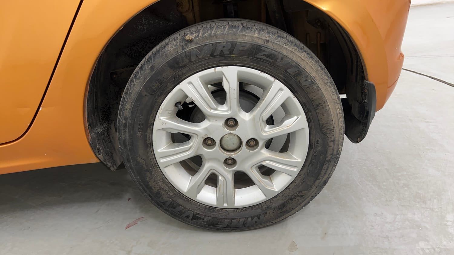 Used 2016 Tata Tiago Revotron XZ Petrol Manual tyres LEFT REAR TYRE RIM VIEW