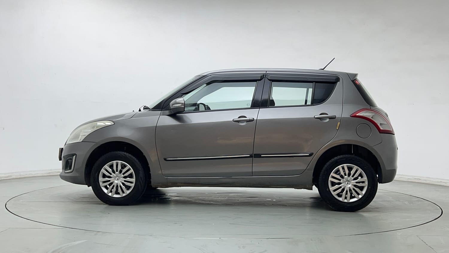 Used 2015 Maruti Suzuki Swift VXi Petrol Manual exterior LEFT SIDE VIEW