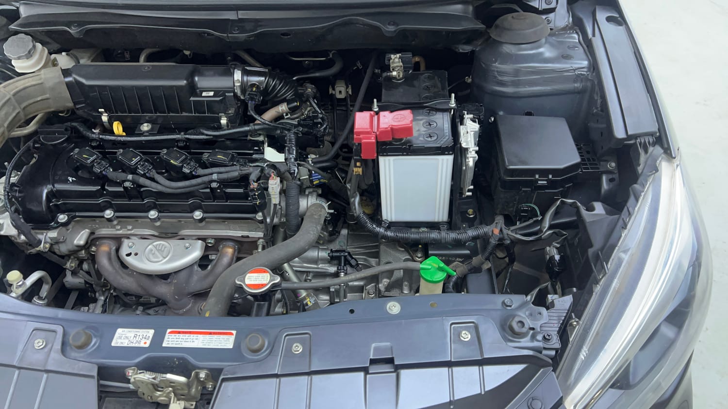 Used 2023 Maruti Suzuki Ciaz Zeta 1.5 Petrol Manual engine ENGINE LEFT SIDE VIEW