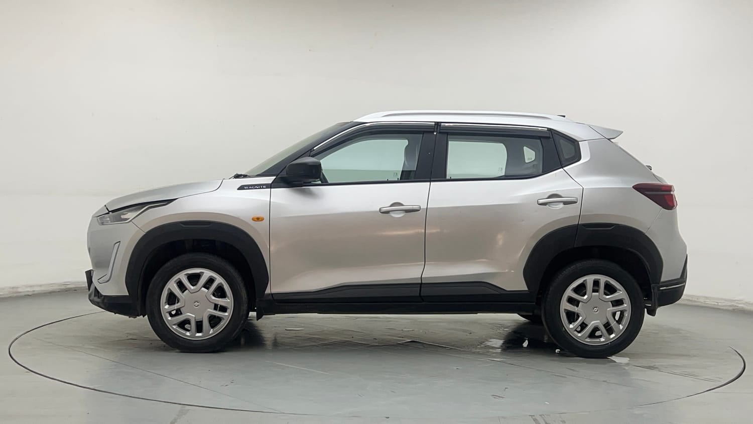 Used 2021 Nissan Magnite XE Petrol Manual exterior LEFT SIDE VIEW