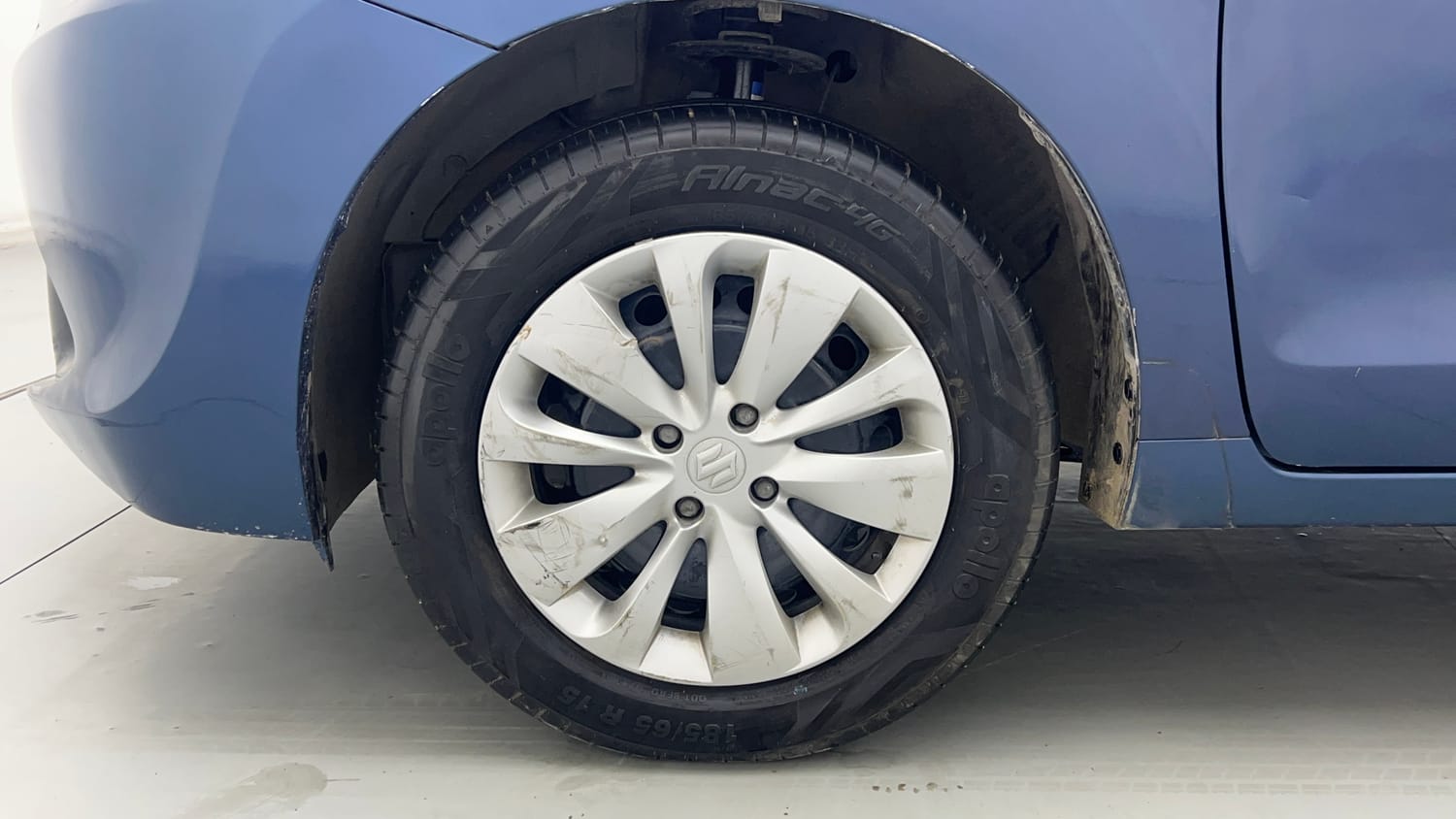 Used 2016 Maruti Suzuki Baleno Delta 1.2 Petrol Manual tyres LEFT FRONT TYRE RIM VIEW