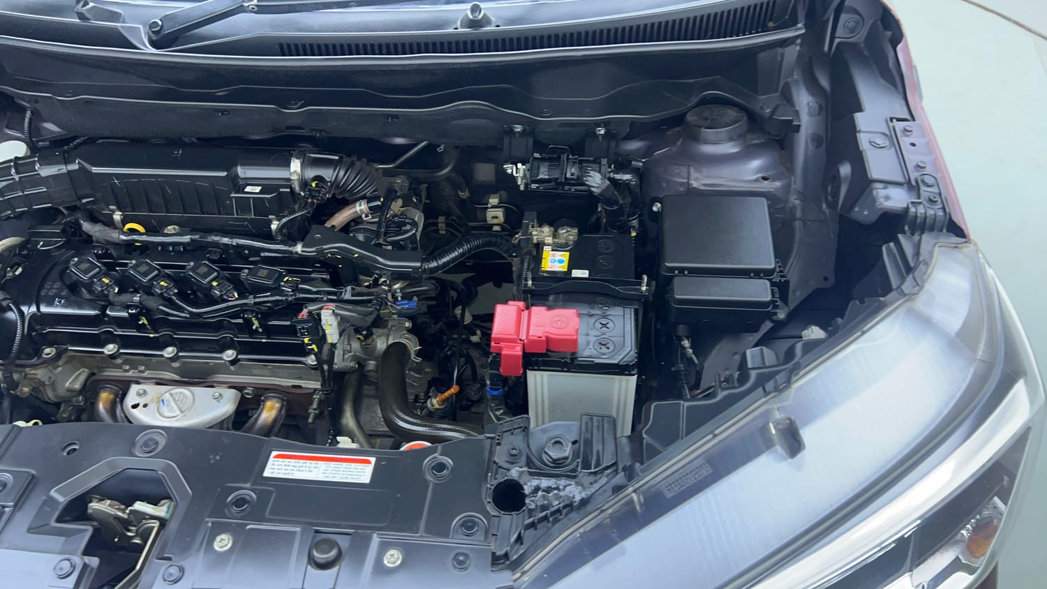 Used 2022 Maruti Suzuki XL6 Zeta AT Petrol Petrol Automatic engine ENGINE LEFT SIDE VIEW