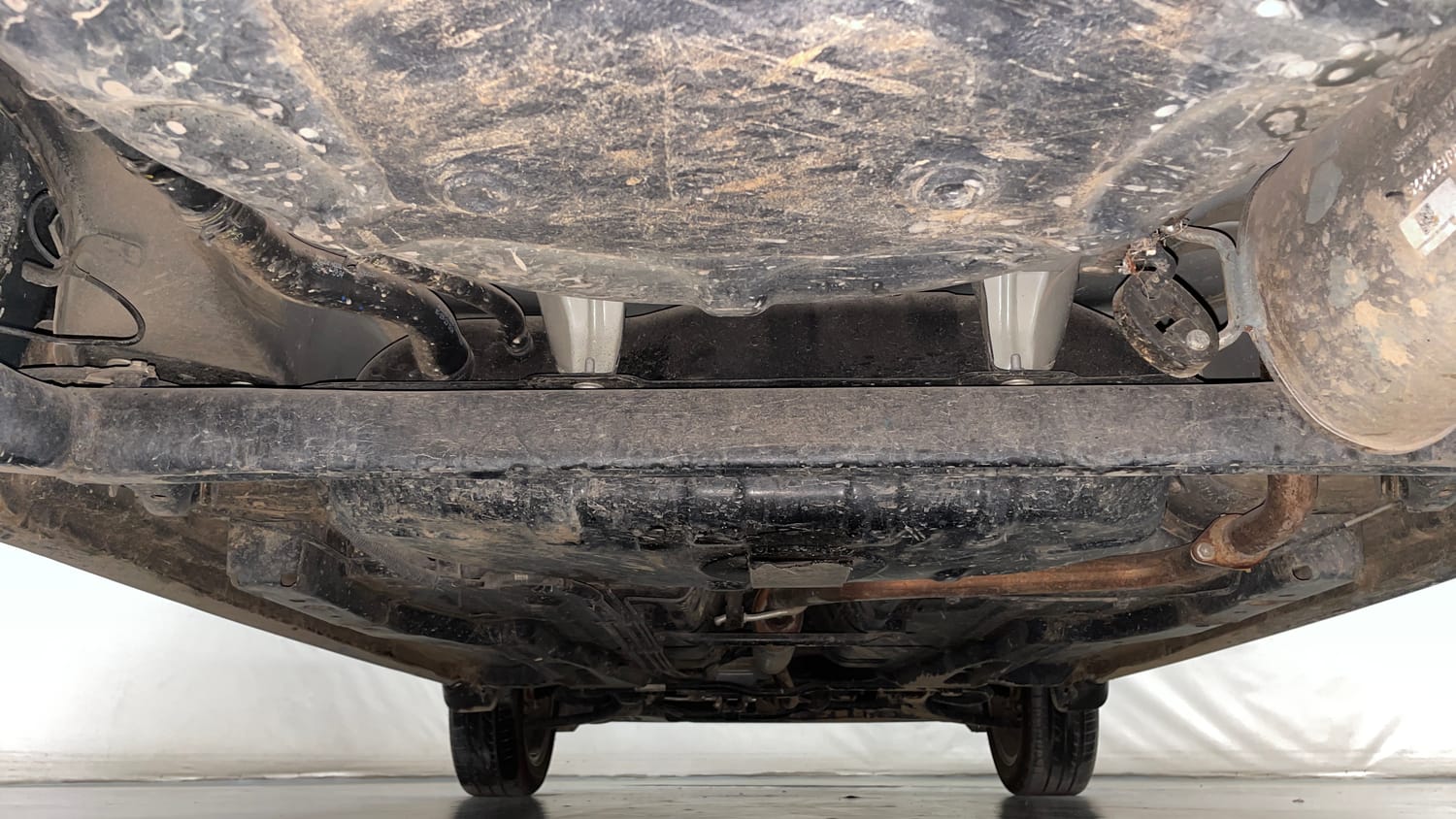 Used 2023 Tata Tigor XZ Plus Petrol Manual extra REAR UNDERBODY VIEW (TAKEN FROM REAR)