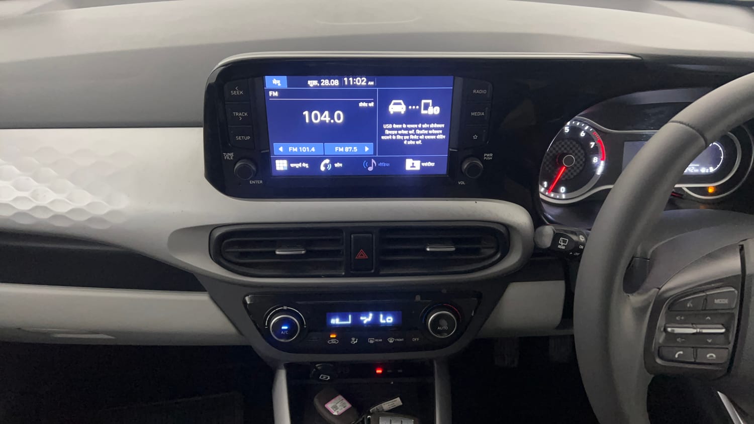 Used 2022 Hyundai Grand i10 Nios Asta 1.2 Kappa VTVT Petrol Manual interior MUSIC SYSTEM & AC CONTROL VIEW