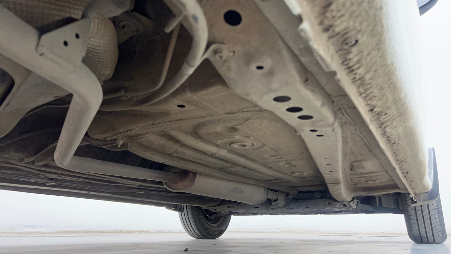 Used 2024 Maruti Suzuki Wagon R VXI 1.0 AGS Petrol Automatic extra REAR RIGHT UNDERBODY VIEW