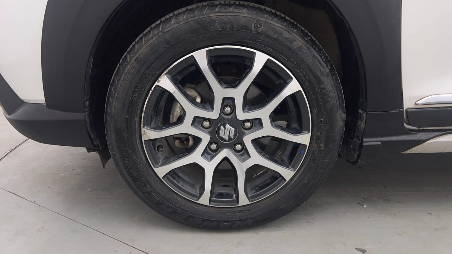 Used 2023 Maruti Suzuki XL6 Zeta AT Petrol Petrol Automatic tyres LEFT FRONT TYRE RIM VIEW