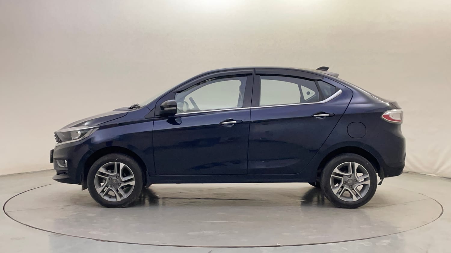Used 2023 Tata Tigor XZ Plus Petrol Manual exterior LEFT SIDE VIEW