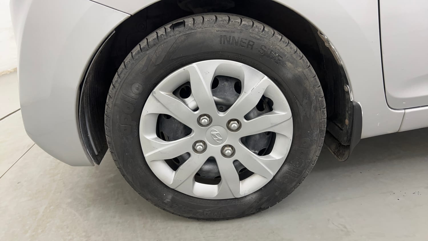 Used 2016 Hyundai Eon Magna Petrol Manual tyres LEFT FRONT TYRE RIM VIEW