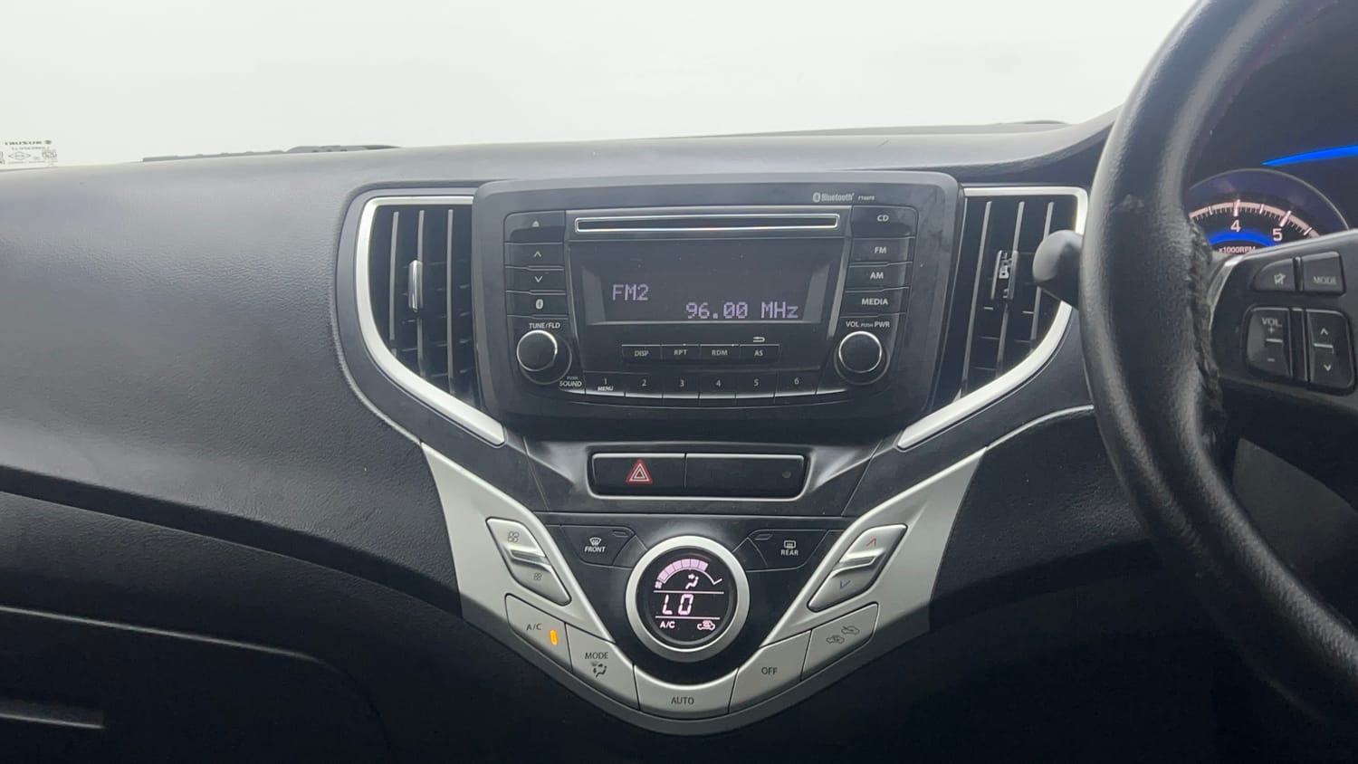 Used 2016 Maruti Suzuki Baleno Delta 1.2 Petrol Manual interior MUSIC SYSTEM & AC CONTROL VIEW