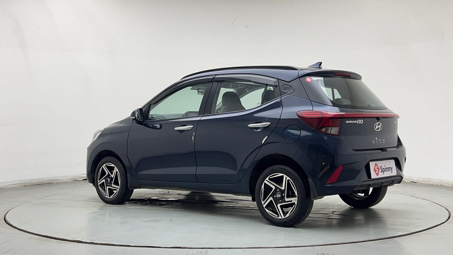 Used 2025 Hyundai Grand i10 Nios Sportz (O) 1.2 Kappa VTVT Petrol Manual exterior LEFT REAR CORNER VIEW