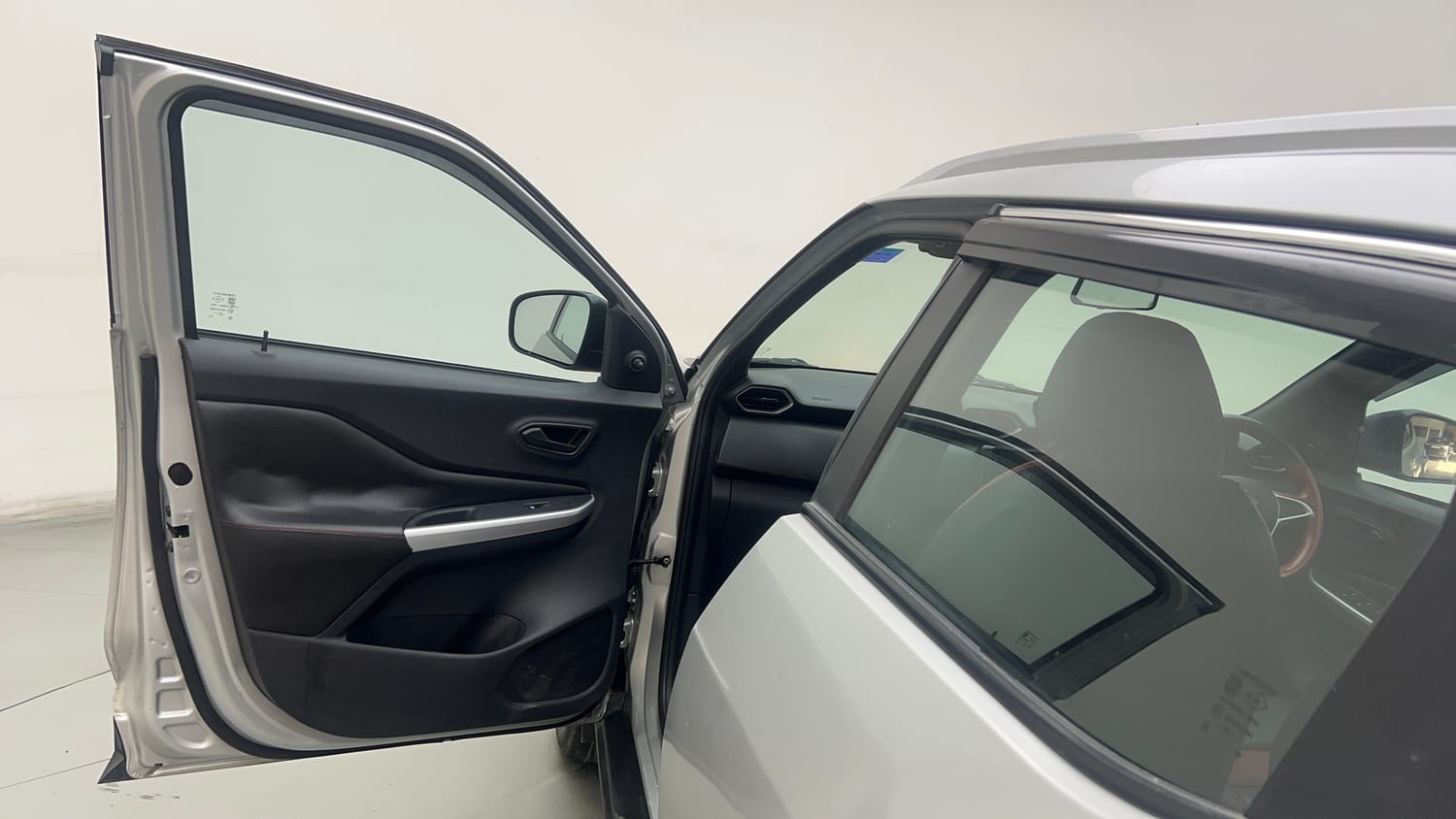 Used 2021 Nissan Magnite XE Petrol Manual interior LEFT FRONT DOOR OPEN VIEW
