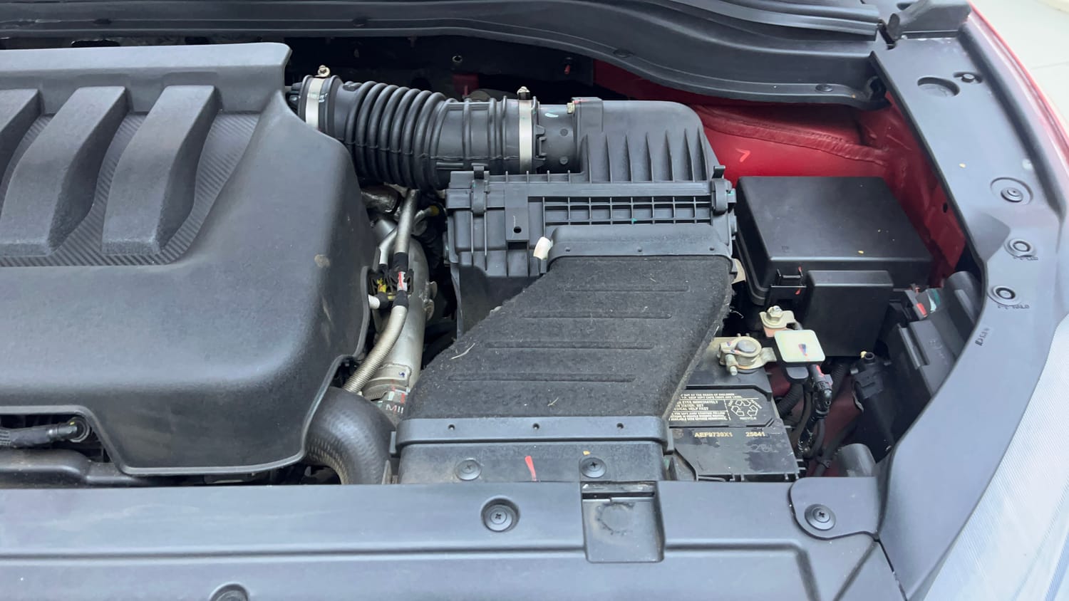 Used 2024 Mahindra XUV700 AX 5 Petrol AT 5 STR Petrol Automatic engine ENGINE LEFT SIDE VIEW