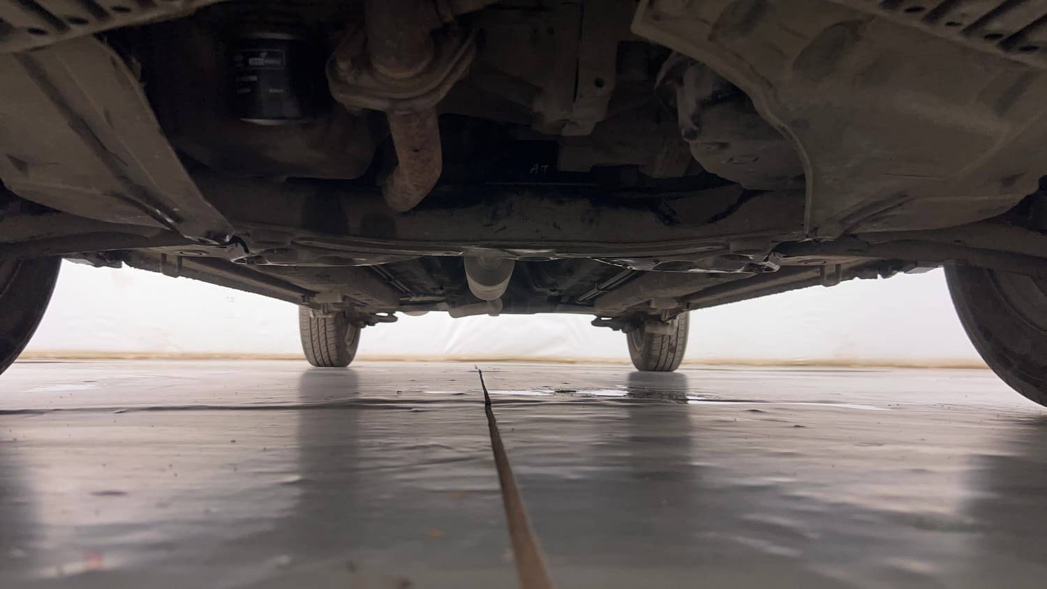 Used 2016 Maruti Suzuki Ciaz ZXi  AT Petrol Automatic extra FRONT LEFT UNDERBODY VIEW