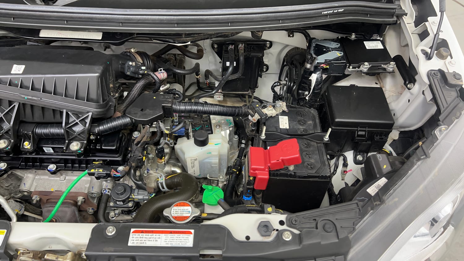 Used 2024 Maruti Suzuki Wagon R VXI 1.0 AGS Petrol Automatic engine ENGINE LEFT SIDE VIEW